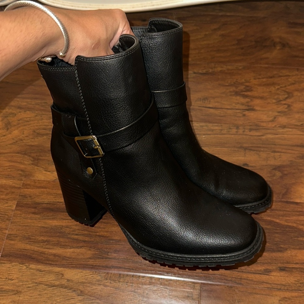Black ankle boots with gold details. Worn once